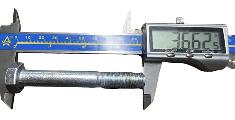 Digital caliper measuring a threaded steel bolt with hex nut.