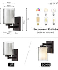 Diagram of a pair of farmhouse style oil rubbed bronze wall sconces with seeded glass shades detailing dimensions and bulb type.