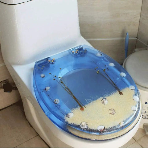 Hella Durable Round Resin Toilet Seat With Crystal Clear Aquarium Vibe And Smooth Sit Ergonomic Comfort Featuring Rock Solid Metal Hinges For A Top Tier Bathroom Setup That Looks Absolutely Sick, featuring blue resin and aquatic decor.