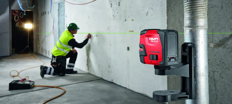 Green Beam Line Laser PM 2 LG With Horizontal And Vertical Alignment in use on construction site for precise layout
