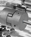 Check Out This 3 Piece Black L075 Jaws Coupler Set With Rubber Spider Inserts Perfect Buffer For CNC Lathe And Motor Pump Connections Easy Hook Up. close-up of black L075 jaw coupler with rubber spider insert and threaded shafts