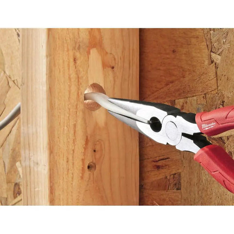 8-Inch Long Nose Pliers With Reaming Head And Onboard Fish Tape Pulling in use on wooden panel with red handle