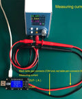 USB DC-DC Step Up Down GoTo Power Regulator Module 3.5V-12V To 1-24V 2-3W with display and connecting cables on green surface