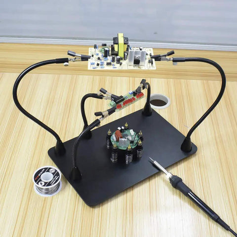Beefy Magnetic Helping Hands Soldering Station with Heavy Duty Metal Base, Six PCB Holders, Five Arms, Alligator Clips in use