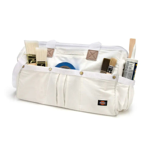 20 Inch Heavy Duty Canvas Tool Tote For Painters Carpenters And Builders With Rugged Zipper And Reinforced Handles Wide Mouth Main Compartment Exterior Pockets And Shoulder Strap In White displaying paintbrushes and tools.