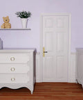 White dressers with installed 5 Pack 2.2 Inch Footed Nickel Ring Drawer Pulls For Cabinets And Cupboards in a bedroom setting.