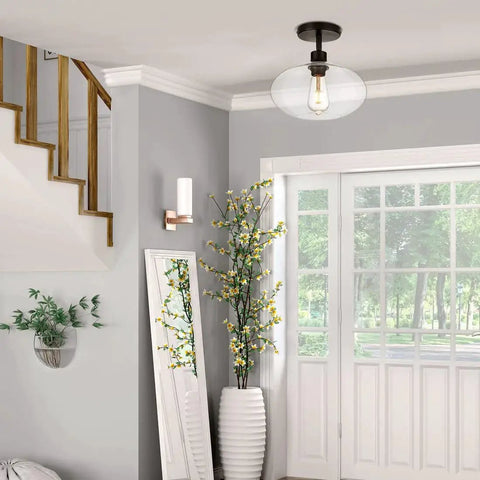 Semi Flush Mount Ceiling Light With Clear Glass Shade Modern Vintage Vibe Fixture in bright hallway setting.