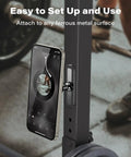 Gym Ready Magnetic Phone Holder With Alloy Base And Ball Joint Attaches To Metal Surfaces Dual Magnetic Mount For MagSafe iPhone 12 13 14 15 16 17 And Android With Metal Ring Secure Grip shown attached to gym equipment.