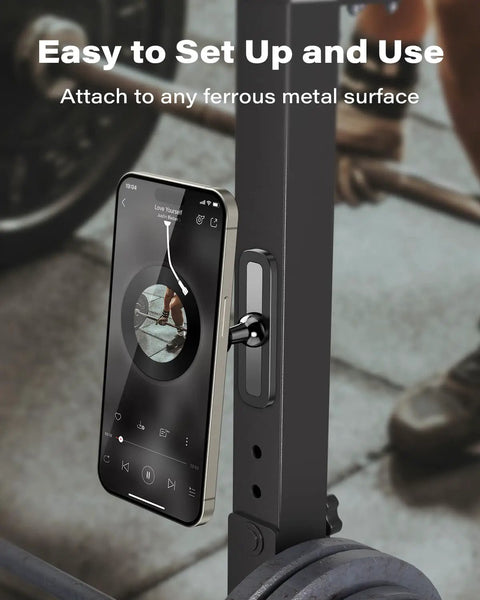 Gym Ready Magnetic Phone Holder With Alloy Base And Ball Joint Attaches To Metal Surfaces Dual Magnetic Mount For MagSafe iPhone 12 13 14 15 16 17 And Android With Metal Ring Secure Grip shown attached to gym equipment.