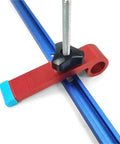 Close-up of Game Changing Aluminum T Track T Slot Fixture Channel with red clamp and blue rail for precise woodshop guides.