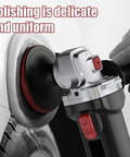 Supercharged 1300W Corded Angle Grinder With 100mm Capacity for polishing a surface, showcasing low noise design and ergonomic grip.
