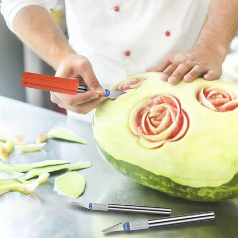 Person carving watermelon with 13 Piece Precision Craft Knife Set With Interchangeable Blades And Ergonomic Handles Ideal For DIY Projects.