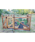 Outdoor garden with wood fence featuring Self Closing Gate Hardware Kit With Self Locking Gate Latch And Two Pack 3.5 Inch Heavy Duty Hinges