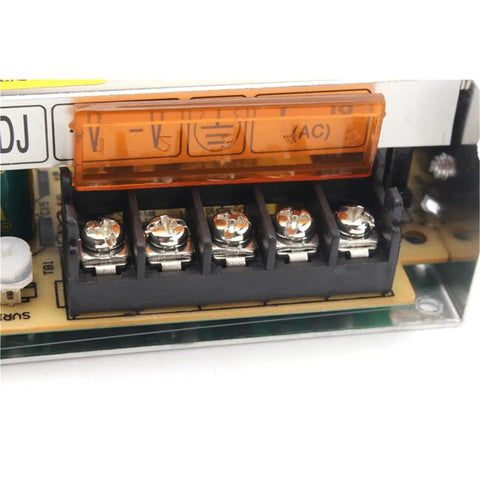 Close-up of Rugged S2524 Switching Power Supply terminal connections for 85 To 264 Volt AC to 24V DC conversion.