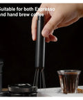 Next Level Espresso Distribution Tool With Retractable Stainless Steel Needle for Portafilter clump crushing in hand.