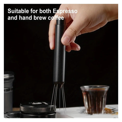 Next Level Espresso Distribution Tool With Retractable Stainless Steel Needle for Portafilter clump crushing in hand.