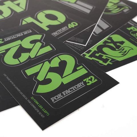 Green Fox Forks And Shocks Decal Kit For Mountain Bikes Durable Vinyl Sticker Set with bold numbers and logos on a sheet.