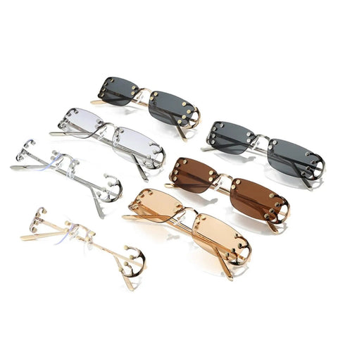 Totally Chic Rimless Women Sunglasses With Dope Silver Metal Frames Featuring Clean Lightweight Rectangle Shades That Bring Major Summer Vibes To Any Fit in various colors.