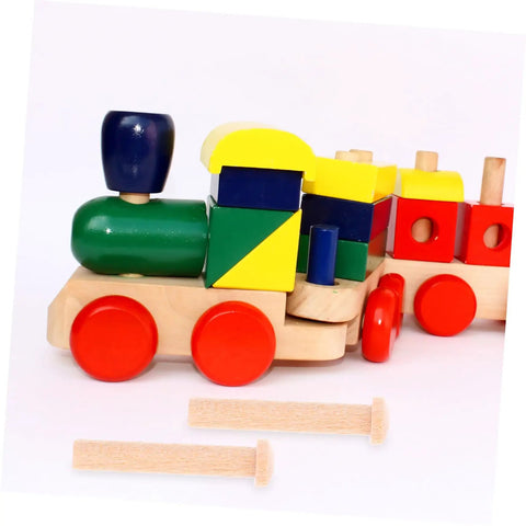 Miniature Wooden T Nails For Crafts And Woodworking With Ergonomic T Head Design next to colorful wooden toy train on a white surface