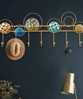 Heavy Duty Wrought Iron Wall Decor With A Dope Partition Rack And Coat Hook This Hand Painted Blue Gold Storage Organizer with hooks and circular designs.