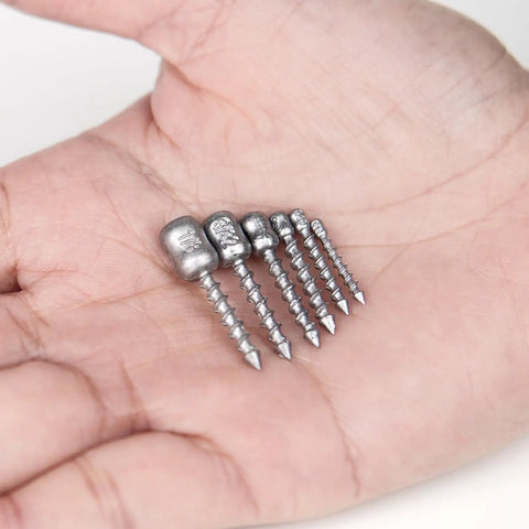 Hard Alloy Screw Nail Weights Set For Bass Fishing Die Cast Sinker Assortment In Six Sizes, shown on a hand