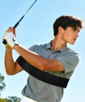 Golfer using Golf Swing Arm Band Training Aid for Correct Posture and Stable Swing Pro Grade Foldable Elastic Band Arm Trainer.
