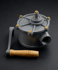 Beefy Rotary Hand Pump For Aluminum Drum Fuel Caddy 30 40 Gallon NPT Thread Inlet One And A Quarter Inch Outlet One Inch Easy No Fuss Manual Fuel Transfer For Gasoline Diesel Portable Oil Pump, side view with wooden handle