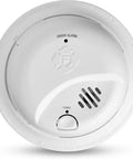 Trusted Dependable Battery Powered Smoke Alarm Featuring Rapid Ionization Alerts For Zero Stress Home Fire Safety And Reliable Nighttime Protection Around The Clock, white round design with test button.