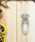 10pcs Premium Stainless Steel Toggle Latch Silver Hasp Locks on wooden surface with tools, ideal for heavy-duty use.