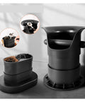 No Sweat Heavy Duty Electric Coffee Knock Box With Automatic Ground Disposal For Large Capacity Espresso Bars and Effortless Portafilter Cleaning that Handles Dregs Like A Pro, featuring rugged polymer material.