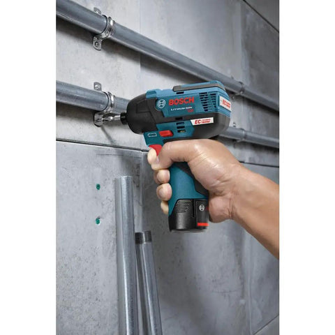 Lightweight 12V Max Brushless Impact Driver Bare Tool With Ultra Compact 5.4 Inch Head And 1.6 Pound Weight being used on wall