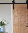 Barn door with Six And A Half Inch Black Pulls Two Pack For Barn Doors Garage Doors Screen Doors Fences And Cabinet Or Tray Board Applications.