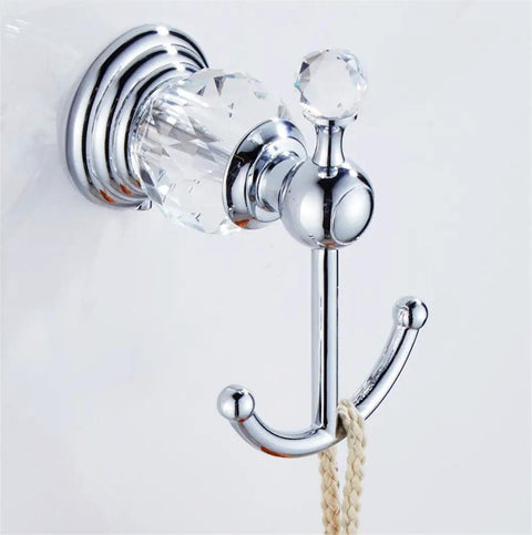 Crystal Bathroom Hardware Set With Retractable Towel Bar Chrome Finish includes wall-mounted chrome coat hook.