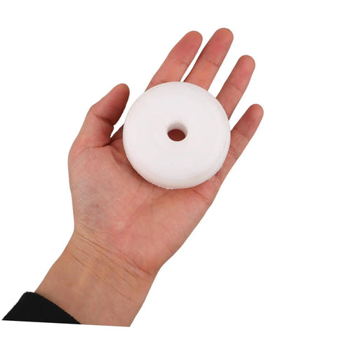 Heavy Hitter Nylon Pulley Wheels With Precision Ball Bearings Smooth Gliding Caster Rollers held in hand, showcasing size and material.
