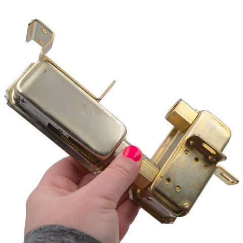Holding Gas Range Dual Oven Safety Valve Assembly Replacement For Bake And Broil Burners with mounting brackets visible