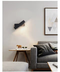 Elevate Your Home Vibe With This Sleek Black Metal Swivel Wall Sconce LED Lighting for Bedroom Living Room and Hallways, showcasing a focused light.