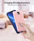 10000mAh Slim Portable Charger, Built In Four Power Bank Cables, Straight Up Travel Essential To Keep Yo Phone Lit Without Any Cord Drama, Ready For Commute, pink portable charger charging a smartphone.