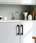 Modern kitchen with 5 Inch Matte Black Cabinet Handles Set Of 10 Heavy Duty Drawer Pulls For Cabinets And Dressers installed.