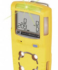 Front view of GasAlert MicroClip XL Four Gas Detector for CO H2S LEL and O2 in bright yellow, displaying sensor readings.