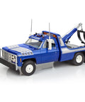 1979 GMC Wrecker Captain Hook Model Kit with telescoping boom and push bumper in blue, side view