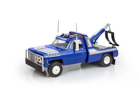 1979 GMC Wrecker Captain Hook Model Kit with telescoping boom and push bumper in blue, side view