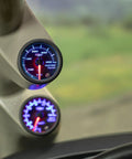 Tinted 7 Color Water Temperature Gauge Kit For Cars And Trucks 100 To 300F Range 2-1/16 Inch 52mm Dial Illuminated Black Face Easy Install Coolant Temp Gauge mounted in dash, blue lit