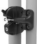 Heavy Duty Chain Link Fence Gate Latch For Round Posts With External Access Button installed on round posts, showcasing adjustable lock mechanism.