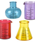 4 Piece Chemistry Beaker Shot Glass Set For Parties And Science Nerds, lab style drinking glasses in various colors and shapes.
