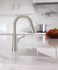 hansgrohe Joleena Pull Down Kitchen Faucet, Transitional, Magnetic Hand Sprayer, 1-Handle, 1.75 GPM, Stainless Steel Optic, 04112800 with flowing water.