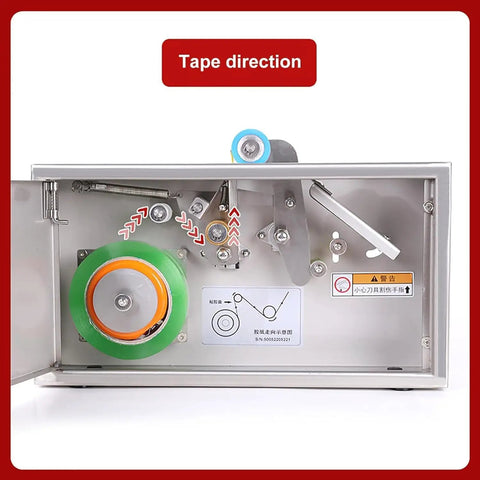 Handy Manual Tape Dispenser Sealer For Cardboard Boxes, Adjustable Length Tool mechanism showing tape direction with wheels.