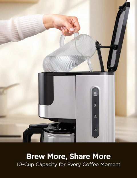 Person pouring water into 10 Cup Drip Coffee Maker With 24 Hour Programmable Timer Glass Carafe And Reusable Mesh Filter