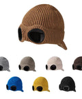 Multiple unisex peak ski beanies with thick fleece lining in various colors. Cozy knit for winter, one size fits most, durable acrylic knit.