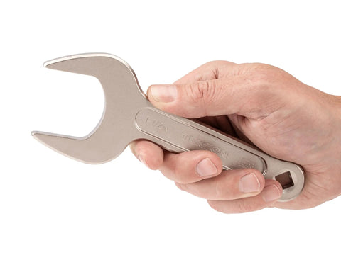 Hand holding One And A Half Inch Service Wrench With Angled Head For Tight Spots Open End Access Wrench With Fifteen Degree Head