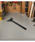 Beefy Heavy Duty T Shaped Gate Hinges With Black Finish for smooth quiet operation shown on workshop floor.